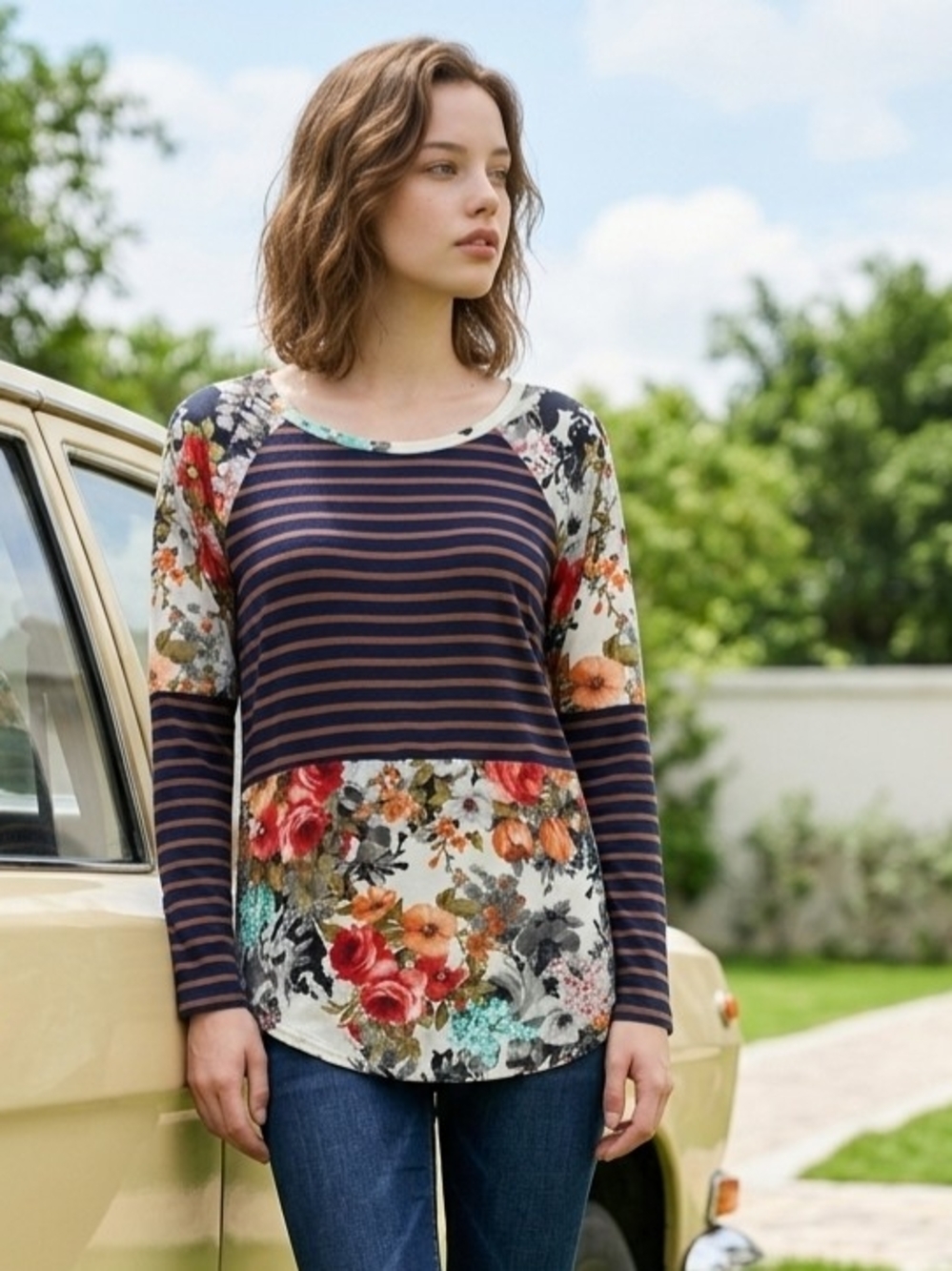 a.gain brand striped raglan top featuring a floral print panel and floral raglan